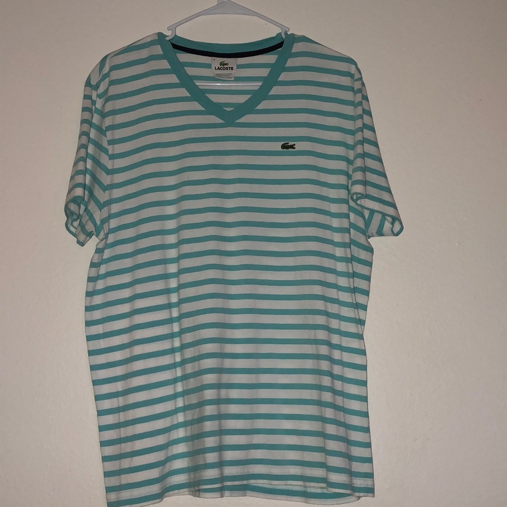 Lacoste light blue & white stripped shirt size 6